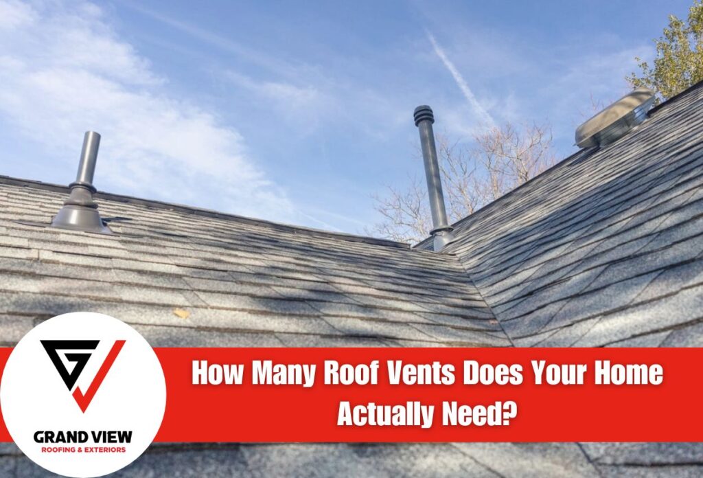 Residential roof with multiple vents and chimneys against blue sky background